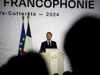 President of the French Republic Emmanuel Macron attends the second and final day of the Francophonie Summit at the Grand Palais in Paris, F...