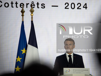 President of the French Republic Emmanuel Macron attends the second and final day of the Francophonie Summit at the Grand Palais in Paris, F...