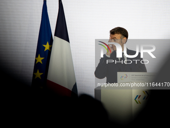 President of the French Republic Emmanuel Macron attends the second and final day of the Francophonie Summit at the Grand Palais in Paris, F...