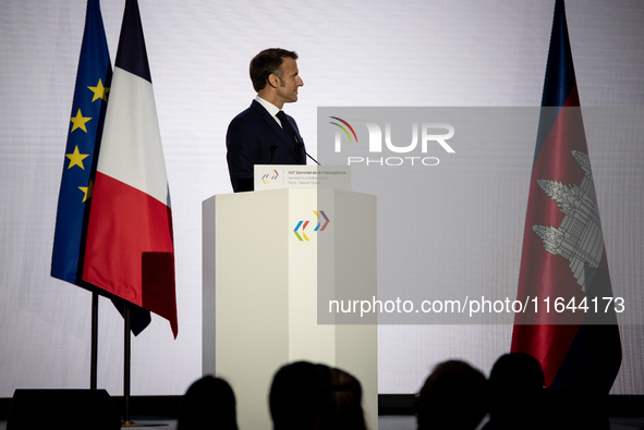 President of the French Republic Emmanuel Macron attends the second and final day of the Francophonie Summit at the Grand Palais in Paris, F...