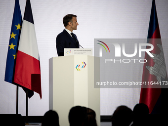 President of the French Republic Emmanuel Macron attends the second and final day of the Francophonie Summit at the Grand Palais in Paris, F...