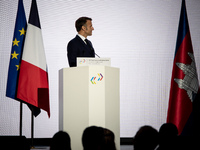 President of the French Republic Emmanuel Macron attends the second and final day of the Francophonie Summit at the Grand Palais in Paris, F...