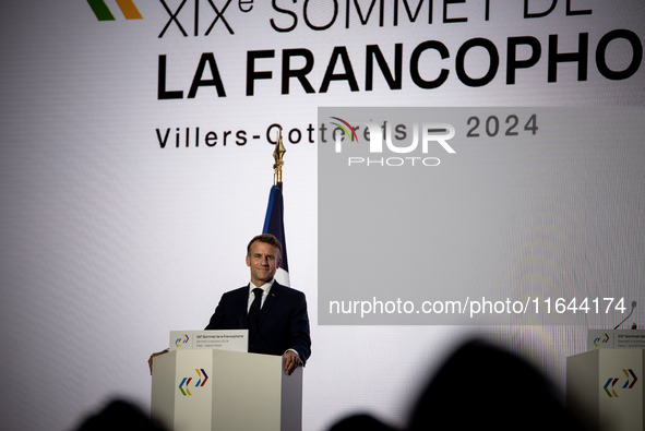 President of the French Republic Emmanuel Macron attends the second and final day of the Francophonie Summit at the Grand Palais in Paris, F...