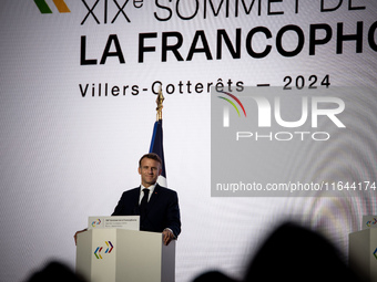 President of the French Republic Emmanuel Macron attends the second and final day of the Francophonie Summit at the Grand Palais in Paris, F...