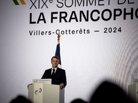 President of the French Republic Emmanuel Macron attends the second and final day of the Francophonie Summit at the Grand Palais in Paris, F...