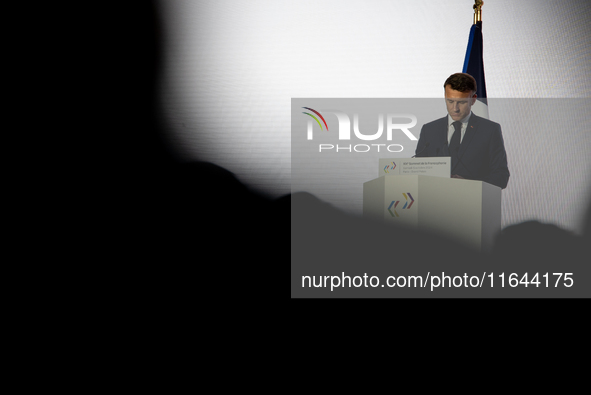 President of the French Republic Emmanuel Macron attends the second and final day of the Francophonie Summit at the Grand Palais in Paris, F...