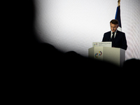 President of the French Republic Emmanuel Macron attends the second and final day of the Francophonie Summit at the Grand Palais in Paris, F...