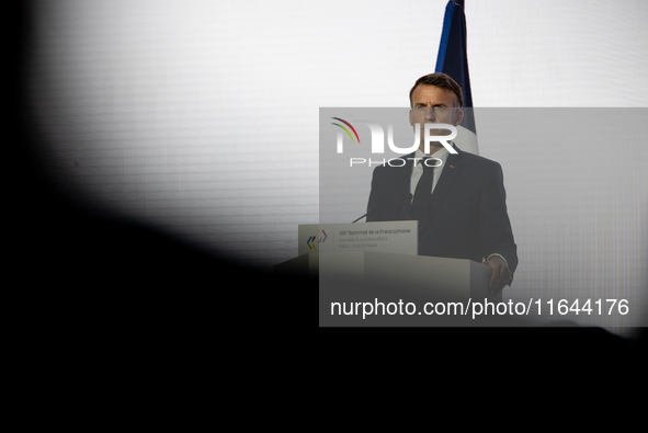 President of the French Republic Emmanuel Macron attends the second and final day of the Francophonie Summit at the Grand Palais in Paris, F...