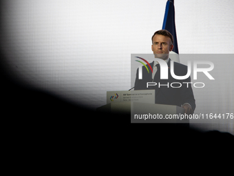 President of the French Republic Emmanuel Macron attends the second and final day of the Francophonie Summit at the Grand Palais in Paris, F...