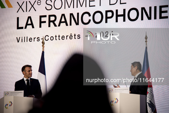 President of the French Republic Emmanuel Macron and Chenda Sophea Sok, Vice-Premier Ministre of Cambodia, the country that will host the ne...