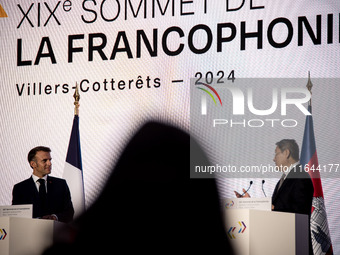 President of the French Republic Emmanuel Macron and Chenda Sophea Sok, Vice-Premier Ministre of Cambodia, the country that will host the ne...