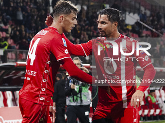 Daniel Maldini and Armando Izzo celebrate the goal during the Serie A football match between AC Monza and AS Roma at U-Power Stadium in Monz...