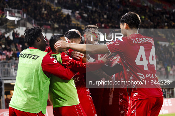 Dany Mota, Daniel Maldini, and Andrea Carboni celebrate after scoring a goal during the Serie A football match between AC Monza and AS Roma...