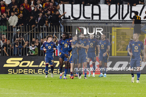 Artem Dovbyk celebrates after scoring a goal during the Serie A football match between AC Monza and AS Roma at U-Power Stadium in Monza, Ita...