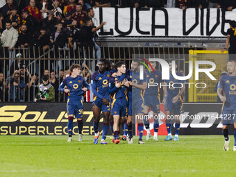 Artem Dovbyk celebrates after scoring a goal during the Serie A football match between AC Monza and AS Roma at U-Power Stadium in Monza, Ita...