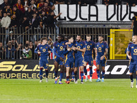 Artem Dovbyk celebrates after scoring a goal during the Serie A football match between AC Monza and AS Roma at U-Power Stadium in Monza, Ita...