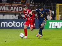 Daniel Maldini plays during the Serie A match between AC Monza and AS Roma at U-Power Stadium in Monza, Italy, on October 6, 2024. (