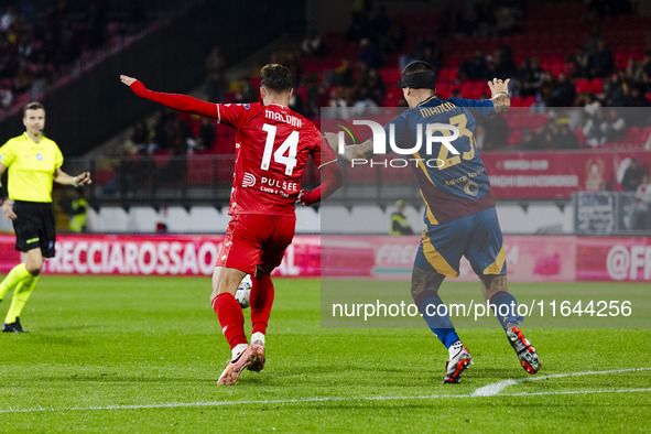 Daniel Maldini and Gianluca Mancini are in action during the Serie A match between AC Monza and AS Roma at U-Power Stadium in Monza, Italy,...