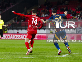 Daniel Maldini and Gianluca Mancini are in action during the Serie A match between AC Monza and AS Roma at U-Power Stadium in Monza, Italy,...