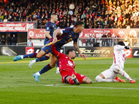 Armando Izzo and Lorenzo Pellegrini play during the Serie A match between AC Monza and AS Roma at U-Power Stadium in Monza, Italy, on Octobe...