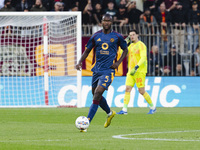 Evan Ndicka plays during the Serie A match between AC Monza and AS Roma in Monza, Italy, on October 6, 2024, at U-Power Stadium (