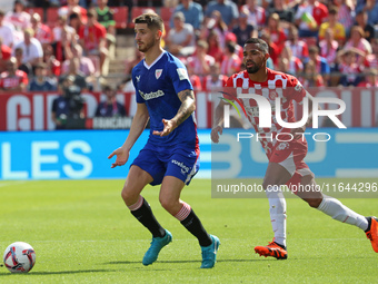 Oihan Sancet and Arnaut Danjuma play during the match between Girona FC and Athletic Club, corresponding to week 9 of LaLiga EA Sport, at th...