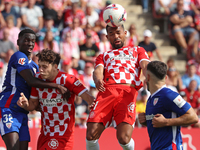 Yangel Herrera, Adama Boiro, and Ladislav Krejci play during the match between Girona FC and Athletic Club, corresponding to week 9 of LaLig...