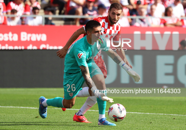 Alex Padilla and Abel Ruiz play during the match between Girona FC and Athletic Club, corresponding to week 9 of LaLiga EA Sport, at the Mon...