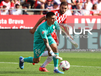 Alex Padilla and Abel Ruiz play during the match between Girona FC and Athletic Club, corresponding to week 9 of LaLiga EA Sport, at the Mon...