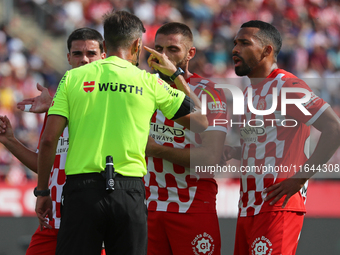 The referee Juan Luis Pulido Santana officiates the match between Girona FC and Athletic Club, corresponding to week 9 of LaLiga EA Sport, a...