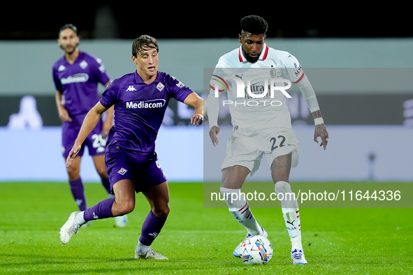 Emerson Royal of AC Milan and Edoardo Bove of ACF Fiorentina compete for the ball during the Serie A Enilive match between ACF Fiorentina an...