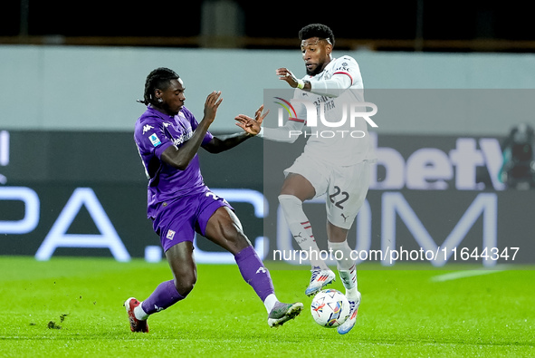 Moise Kean of ACF Fiorentina and Emerson Royal of AC Milan compete for the ball during the Serie A Enilive match between ACF Fiorentina and...