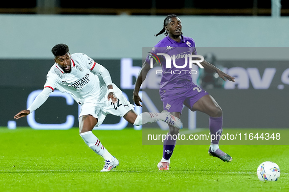 Moise Kean of ACF Fiorentina and Emerson Royal of AC Milan compete for the ball during the Serie A Enilive match between ACF Fiorentina and...