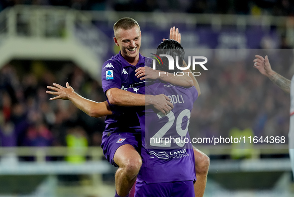 Yacine Adly of ACF Fiorentina celebrates with Albert Gudmundsson after scoring first goal during the Serie A Enilive match between ACF Fiore...