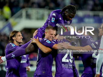 Yacine Adly of ACF Fiorentina celebrates with his team-mates scoring first goal during the Serie A Enilive match between ACF Fiorentina and...