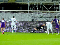 David De Gea of ACF Fiorentina saves the penalty kick of Theo Hernandez of AC Milan during the Serie A Enilive match between ACF Fiorentina...