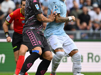 Alberto Grassi of Empoli F.C. and Mattia Zaccagni of S.S. Lazio are in action during the 7th day of the Serie A Championship between S.S. La...