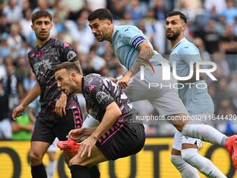 Ardian Ismajli of Empoli F.C. and Mattia Zaccagni of S.S. Lazio are in action during the 7th day of the Serie A Championship between S.S. La...