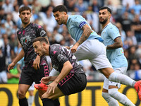 Ardian Ismajli of Empoli F.C. and Mattia Zaccagni of S.S. Lazio are in action during the 7th day of the Serie A Championship between S.S. La...