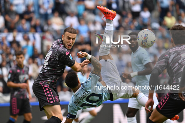 Ardian Ismajli of Empoli F.C. and Mattia Zaccagni of S.S. Lazio are in action during the 7th day of the Serie A Championship between S.S. La...