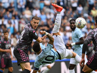 Ardian Ismajli of Empoli F.C. and Mattia Zaccagni of S.S. Lazio are in action during the 7th day of the Serie A Championship between S.S. La...