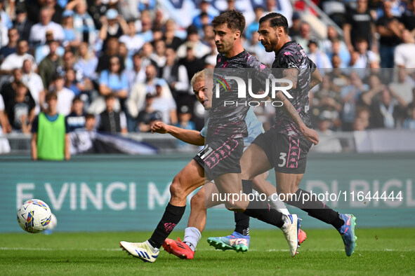 Gustav Isaksen of S.S. Lazio, Mattia Viti, and Giuseppe Pezzella of Empoli F.C. are in action during the 7th day of the Serie A Championship...