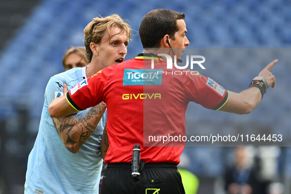 Nicolo Rovella of S.S. Lazio and Referee Giovanni Ayroldi are present during the 7th day of the Serie A Championship between S.S. Lazio and...