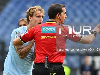 Nicolo Rovella of S.S. Lazio and Referee Giovanni Ayroldi are present during the 7th day of the Serie A Championship between S.S. Lazio and...