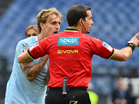 Nicolo Rovella of S.S. Lazio and Referee Giovanni Ayroldi are present during the 7th day of the Serie A Championship between S.S. Lazio and...