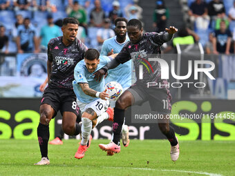 Tino Anjorin of Empoli F.C., Mattia Zaccagni of S.S. Lazio, and Emmanuel Gyasi of Empoli F.C. are in action during the 7th day of the Serie...