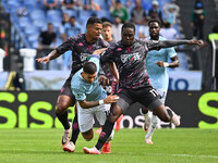 Tino Anjorin of Empoli F.C., Mattia Zaccagni of S.S. Lazio, and Emmanuel Gyasi of Empoli F.C. are in action during the 7th day of the Serie...