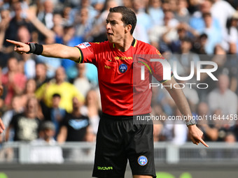 Referee Giovanni Ayroldi officiates during the 7th day of the Serie A Championship between S.S. Lazio and Empoli F.C. at the Olympic Stadium...