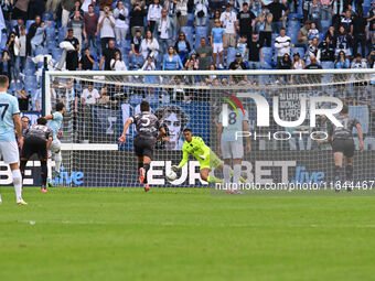 Devis Vasquez of Empoli F.C. saves the penalty taken by Valentin Castellanos of S.S. Lazio during the 7th day of the Serie A Championship be...