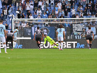 Devis Vasquez of Empoli F.C. saves the penalty taken by Valentin Castellanos of S.S. Lazio during the 7th day of the Serie A Championship be...